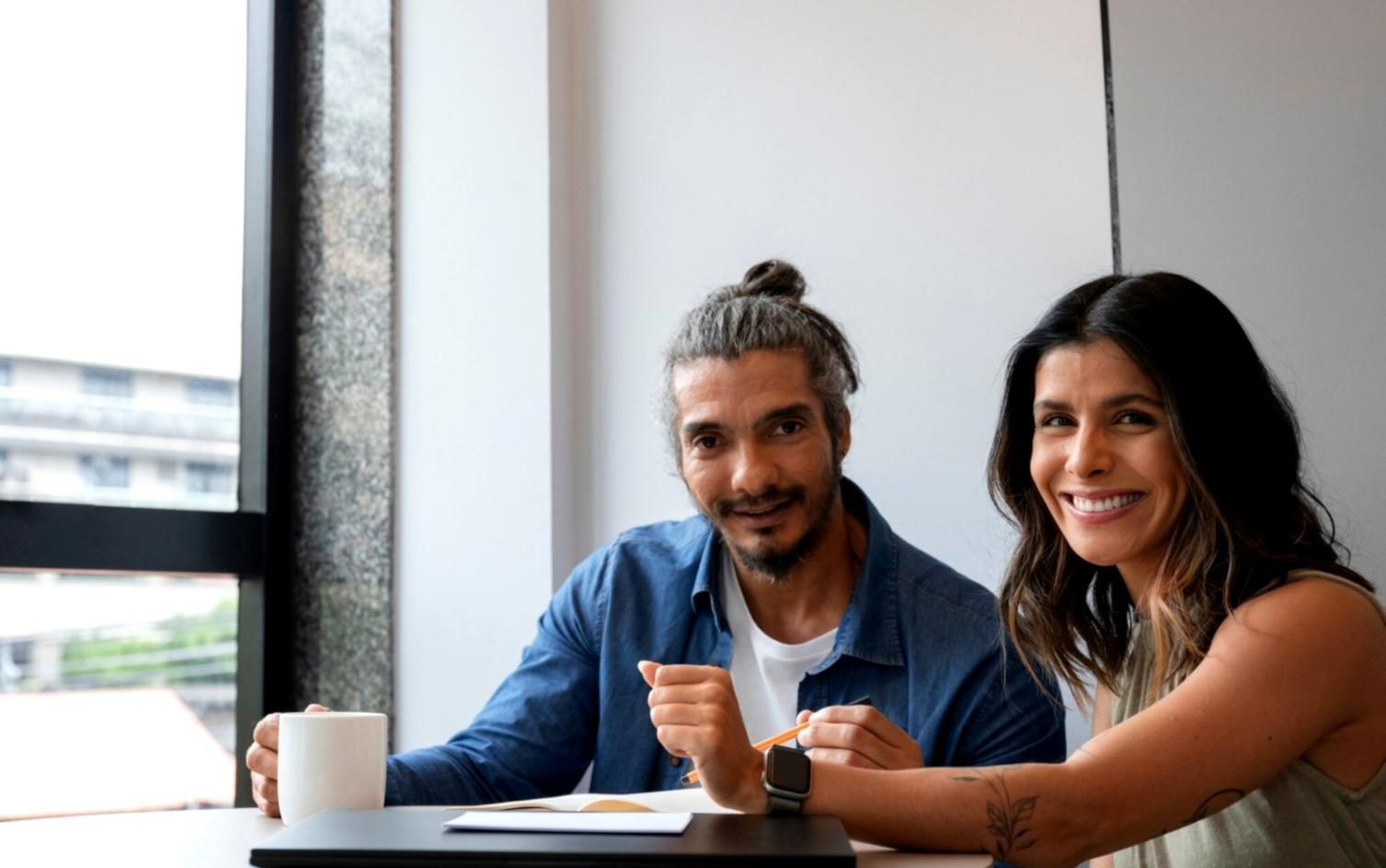 Workshop participants collaborating on mobile SEO optimization during hands-on training session